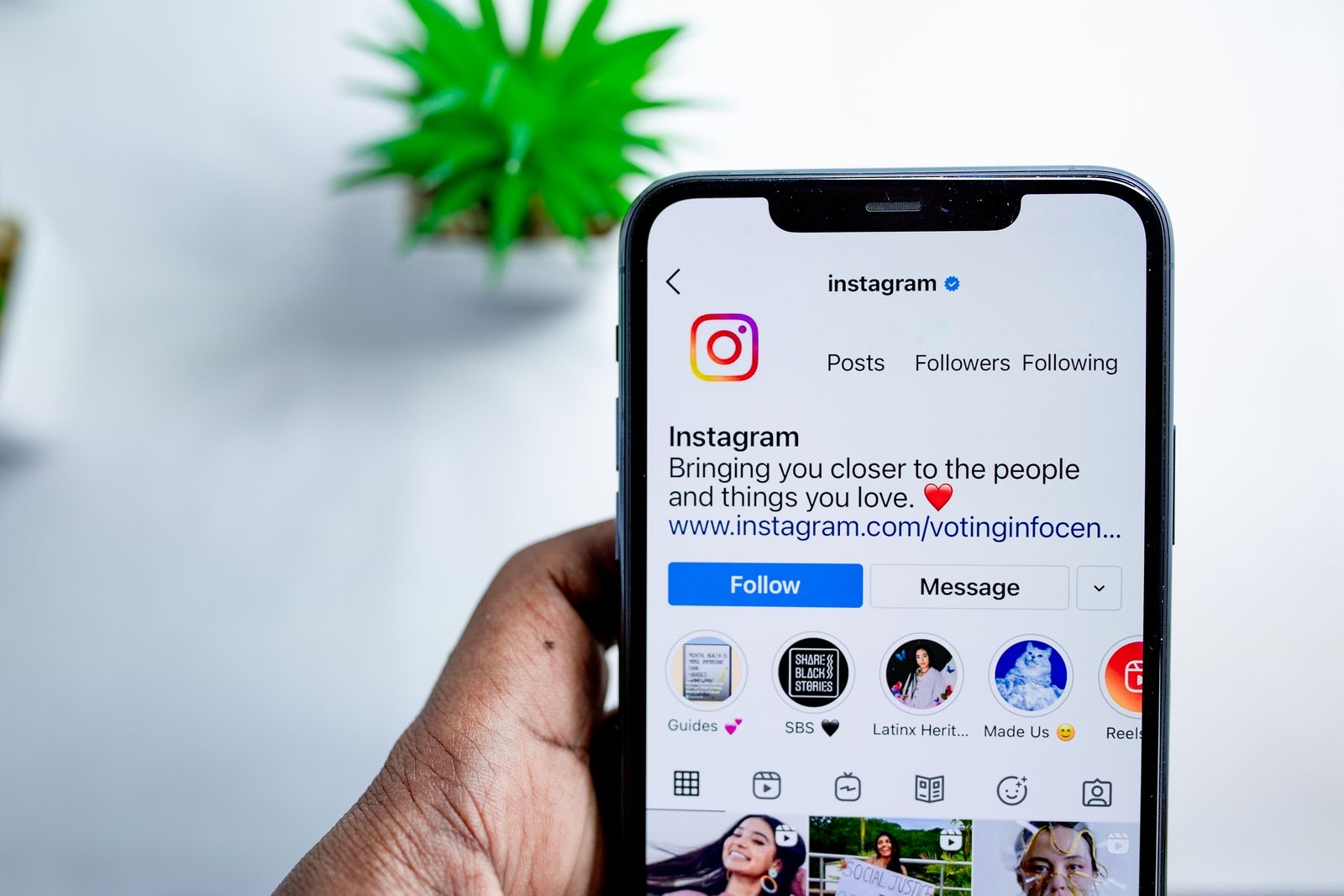 Instagram profile open on a phone, showing posts, followers and following counts